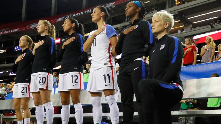 Megan Rapinoe #15 kneels during the National Anthem prior to the match between the United States and the Netherlands at Georgia Dome on September 18, 2016 in Atlanta, Georgia