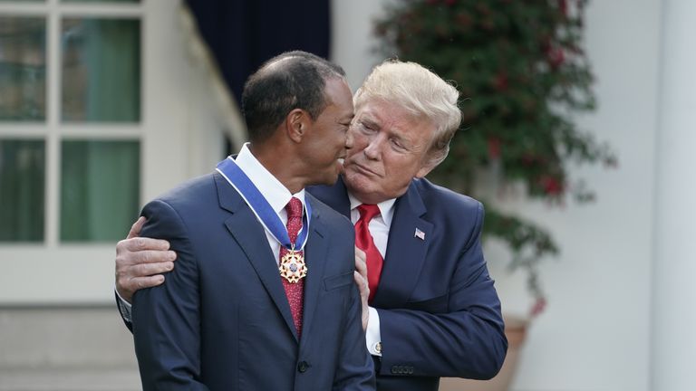 U.S. President Donald Trump gives professional golfer and business partner Tiger Woods the Medal of Freedom during a ceremony in the Rose Garden at the White House May 06, 2019 in Washington, DC. Trump announced he would give the nation’s highest civilian honor to Woods, 43, in honor of his Masters victory last month    