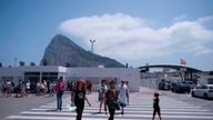 A group of people cross the border of the British Colony of Gibraltar in La Linea de la Concepcion on June 2, 2017. 
Vaults dug deep inside the Rock of Gibraltar hide a prized treasure: servers that power the websites of online gaming companies, the tiny British territory's main activity whose future is threatened by Brexit. / AFP PHOTO / JORGE GUERRERO        (Photo credit should read JORGE GUERRERO/AFP via Getty Images)