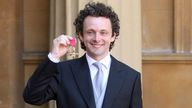 Actor Michael Sheen after receiving an OBE at Buckingham Palace in 2009