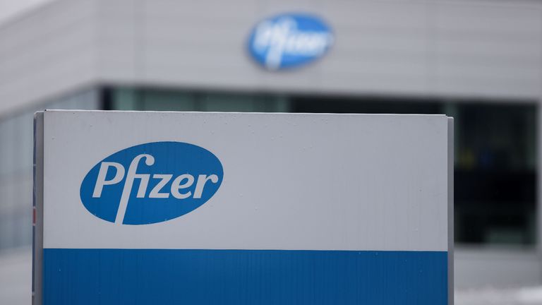 The logo of US multinational pharmaceutical company Pfizer, is pictured at a factory in Puurs, where Covid-19 vaccines are being produced for Britain, on December 3, 2020. - Britain on December 2, 2020 became the first western country to approve a Covid-19 vaccine for general use, while Japan and Italy pledged free inoculations for all even as the global death toll rose towards 1.5 million. (Photo by Kenzo TRIBOUILLARD / AFP) (Photo by KENZO TRIBOUILLARD/AFP via Getty Images)