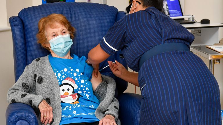 Margaret Keenan, 90, is the first patient in the United Kingdom to receive the Pfizer/BioNtech covid-19 vaccine at University Hospital, Coventry, administered by nurse May Parsons, at the start of the largest ever immunisation programme in the UK's history.