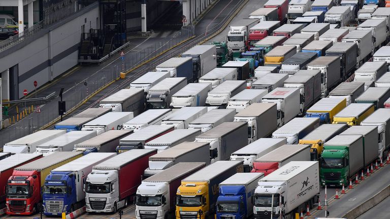 Freight lorries are seen queueing as they wait to enter the port of Dover on the south coast of England on December 10, 2020, before boarding a ferry to Europe. - Big queues of lorries snaked into the port of Dover on England's south coast for another day with high volumes of freight traffic and disruption at other cargo ports put down to Brexit stockpiling, pre-Christmas build up and transport of medical supplies for Covid care increasing demand. If Britain leaves the EU single market on December 31, 2020, without a follow-on trade agreement, the damage caused by delays to travellers and freight at its borders will be compounded by import tariffs. (Photo by JUSTIN TALLIS / AFP) (Photo by JUSTIN TALLIS/AFP via Getty Images)