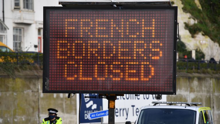 A sign informs drivers that the French border crossing is closed at the cordoned entrance to the ferry terminal at the Port of Dover in Kent, south east England on December 22, 2020, after France closed its borders to accompanied freight arriving from the UK due to the rapid spread of a new coronavirus strain. - Britain sought to sound a note of calm saying they were working as fast as possible to unblock trade across the Channel after France shut its borders to UK hauliers in a bid to contain a new variant of the coronavirus. (Photo by JUSTIN TALLIS / AFP) (Photo by JUSTIN TALLIS/AFP via Getty Images)
