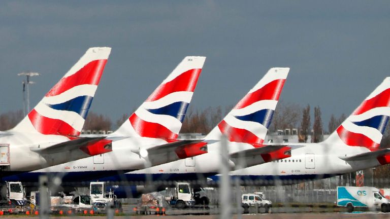 This picture shows British Airways planes grounded at Heathrow&#39;s airport terminal 5, in west London, on March 16, 2020. 