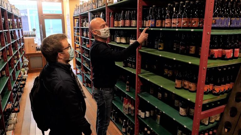 Beer Mania is an institution in Brussels. Under coronavirus restrictions the bar had to close but the shop is still open, although footfall is low.
Beer Mania founder Michael Eftekhari tells us he cherishes the few customers he now sees personally. He&#39;s lost 90% or his trade and has had to adapt.