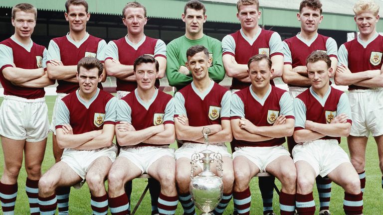 The Burnley Division One championship winning squad of season 1959-60 pose with the trophy at Turf Moor, Burnley, England, selected players include Ray Pointer (back row right)John Connelly (front row left) Jimmy McIlroy (front row second left) Jimmy Adamson (front row centre)
