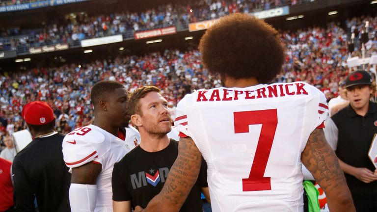 Nate Boyer talks with Colin Kaepernick 