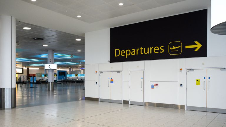 Deserted check-in desks and passenger facilities in the North Terminal at Gatwick Airport 