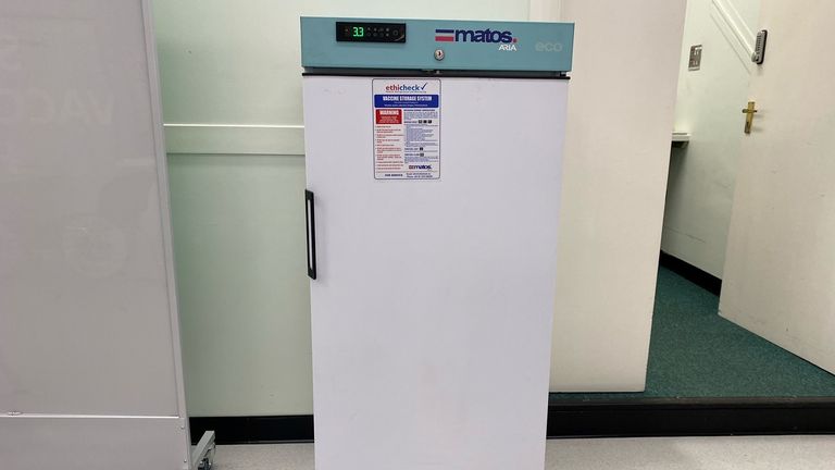 Vaccine doses are stored in this refrigerator before mixing and administration.