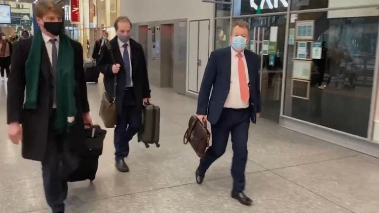 Lord Frost (right) arriving in Brussels on Sunday