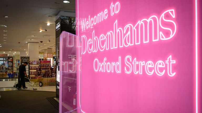 A member of staff works inside the flagship branch of the Debenhams department store on December 01, 2020 in London, England. 