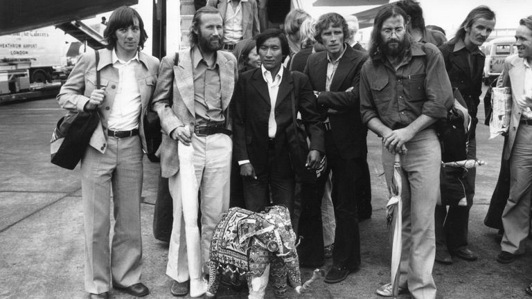 17th October 1975: British Mountaineer Chris Bonington and other members of the successful 1975 expedition to climb the South West Face of Everest, at Heathrow Airport. Left to right: Peter Boardman; Chris Bonington, a sherpa, Dougal Haston (1940 - 1977), Doug Scott and his wife Jan. (Photo by Keystone/Getty Images)