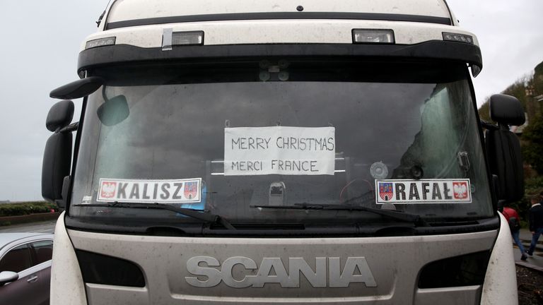 Banner read & # 39;  Merry Christmas Merci France & # 39;  Seen on the windshield of a truck parked in Dover Harbor on December 23, 2020 in Dover, UK.