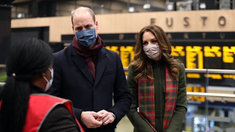The Duke and Duchess of Cambridge speak to transport workers at London Euston Station ahead of boarding the royal train as they leave London for a tour across the UK.