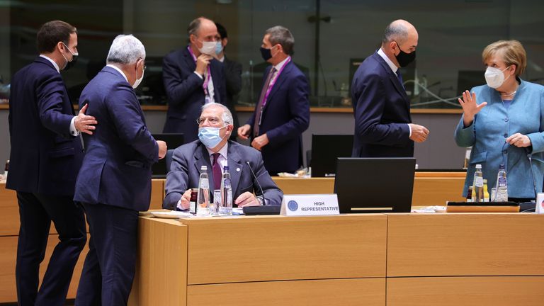 German Chancellor Angela Merkel (left), pictured with Slovenian Prime Minister Janez Jansa, was also at the EU summit