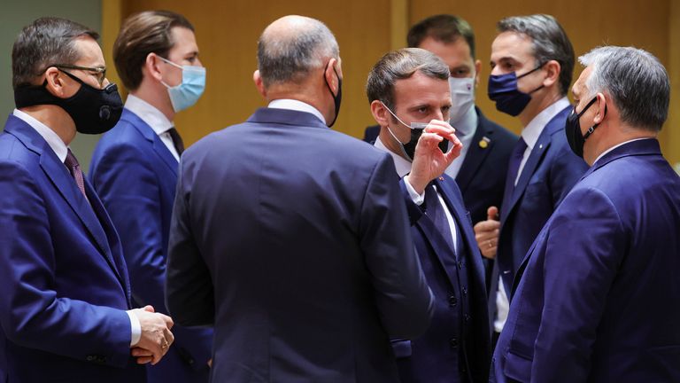 French President Emmanuel Macron speaks with Hungary&#39;s prime minister Viktor Orban next to Poland&#39;s PM Mateusz Morawiecki, Austria&#39;s chancellor Sebastian Kurz and Greece&#39;s PM Kyriakos Mitsotakis during an EU summit in Brussels, Belgium