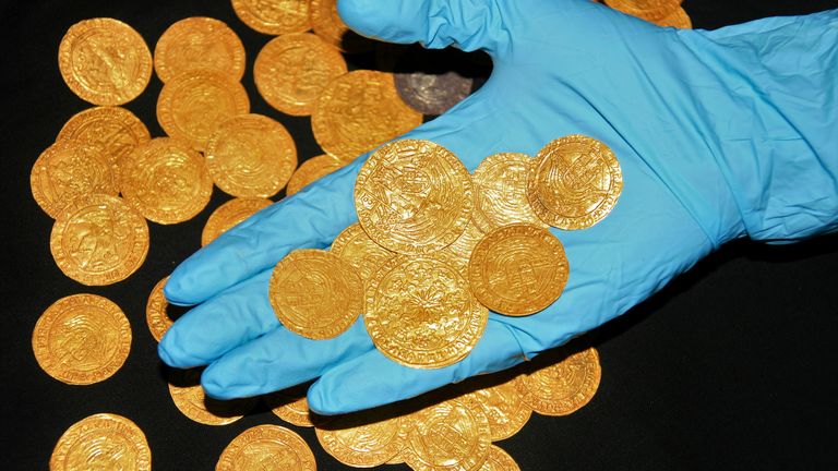 The gold coins were found by a gardener who was pulling up weeds in Hampshire