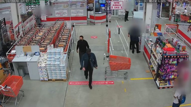 Two men were captured on CCTV after buying cable ties from a hardware store