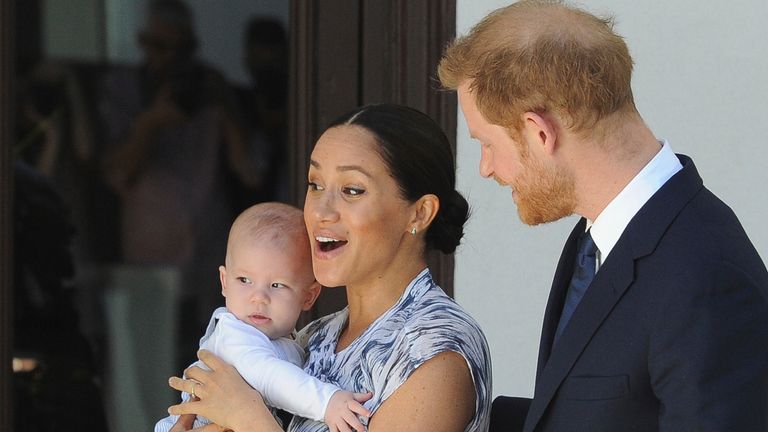Britain&#39;s Prince Harry and Meghan, Duchess of Sussex, holding their son Archie, meets with Anglican Archbishop Emeritus, Desmond Tutu, and his wife Leah in Cape Town, South Africa, Wednesday, Sept. 25, 2019. The royal couple are on the third day of their African tour. (Henk Kruger/African News Agency via AP, Pool)