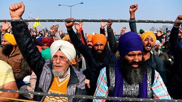 Farmers protest at the Delhi-Haryana state border in Singhu 