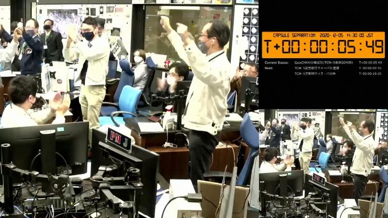 Celebrations in the control room to confirm the separation.  Credit: JAXA