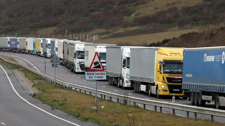 Lorries queue on the A20 to enter the port of Dover in Kent. Christmas stockpiling and Brexit uncertainty have again caused huge queues of lorries to stack up in Kent. The latest delays came as the UK marked less than two weeks until 2021 and the end of the Brexit transition period.