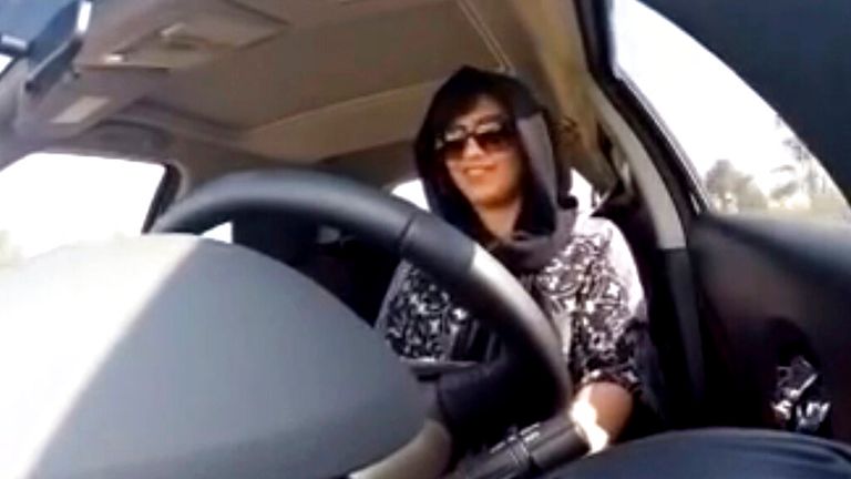 FILE - In this Nov. 30, 2014 image made from video released by Loujain al-Hathloul, al-Hathloul drives towards the United Arab Emirates - Saudi Arabia border before her arrest on Dec. 1 in Saudi Arabia. Al-Hathloul, one of Saudi Arabia’s most prominent women’s rights activists, who pushed for the right to drive, was sentenced on Monday, Dec. 28, 2020, to nearly six years in prison under a vague and broadly-worded law aimed at combating terrorism, according to state-linked media. Her case and imp