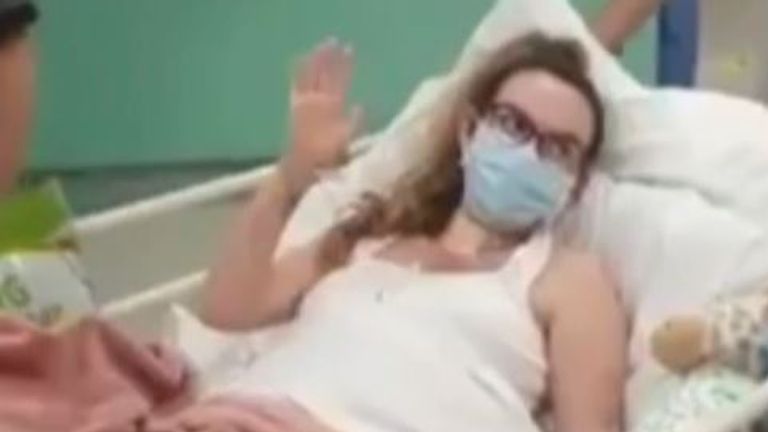 Lura Savage is applauded as she leaves intensive care after being in a coma with COVID-19