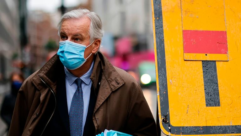 EU chief negotiator Michel Barnier, wearing a protective face covering to combat the spread of the coronavirus, walks to a conference centre in central London on December 3, 2020 as talks continue on a trade deal between the EU and the UK