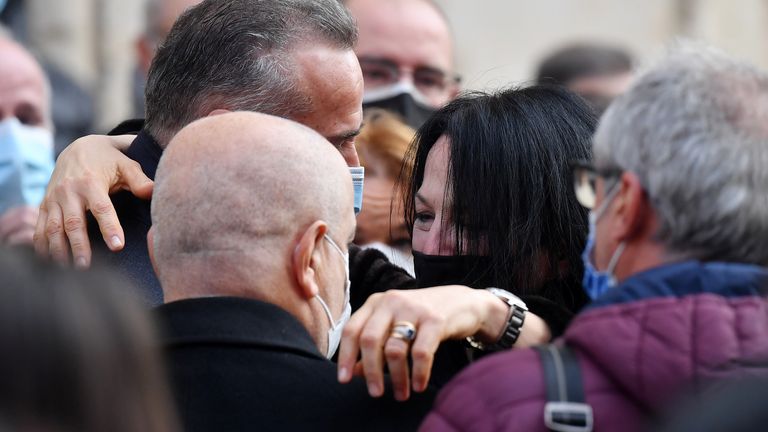 The wife of Paolo Rossi, Federica Cappelletti wears a protective face mask after the funeral 