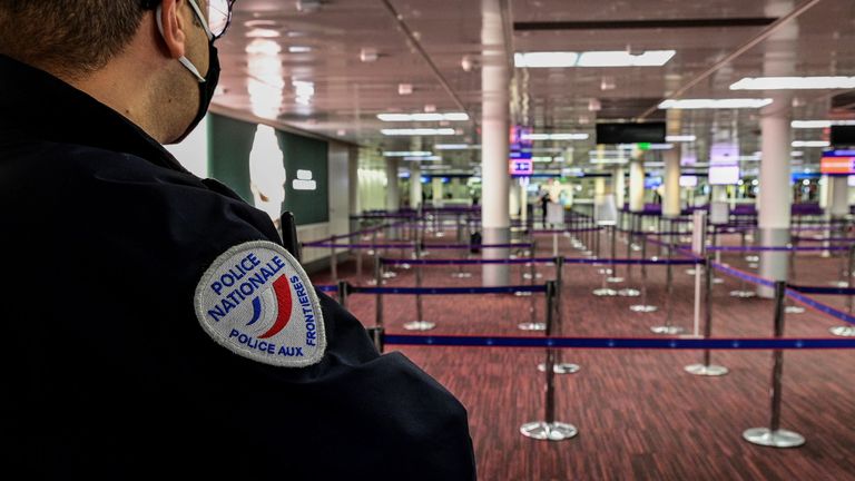 A police officer at Charles De Gaulle airport in Paris