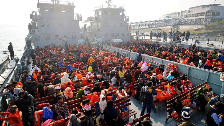 Rohingyas prepare to board a ship as they move to Bhasan Char island near Chattogram
