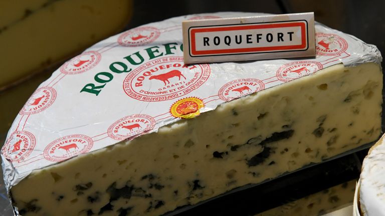 A picture taken on october 18, 2019 shows AOP (Appellation d&#39;Origine Protegee - Protected Designation of Origin) Roquefort cheese during the AOP fair in front of the Hotel de Ville in Paris.