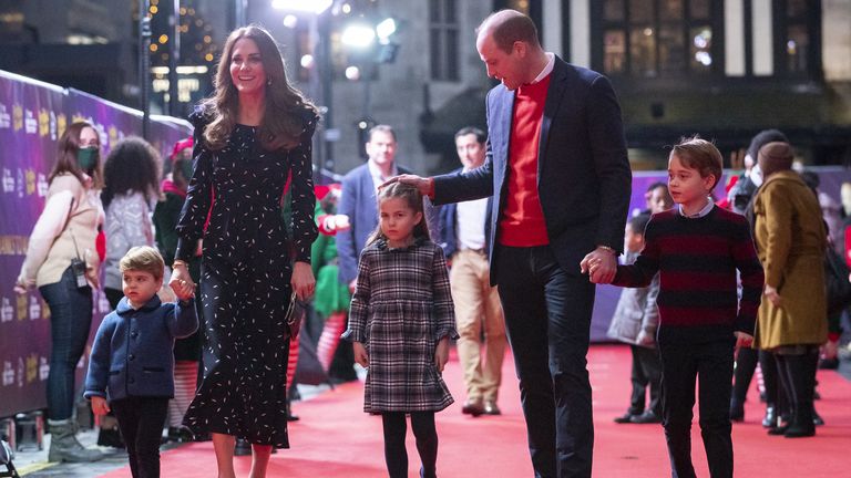 William reassures Princess Charlotte on the way in for the panto