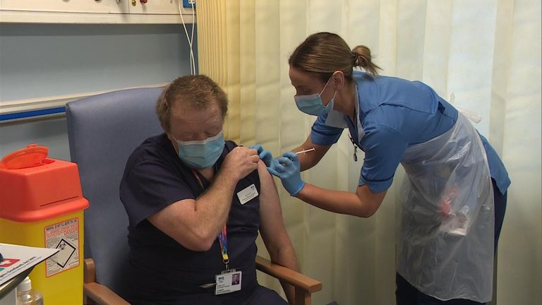 An NHS worker, Andrew Mencnarowski, was the first person in Scotland to receive the Pfizer/BioNTech vaccine