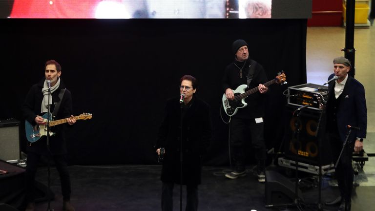 Singer Shakin' Stevens performs for the Duke and Duchess of Cambridge at London Euston Station as they prepare to board the royal train ahead of leaving London for a tour across the UK.