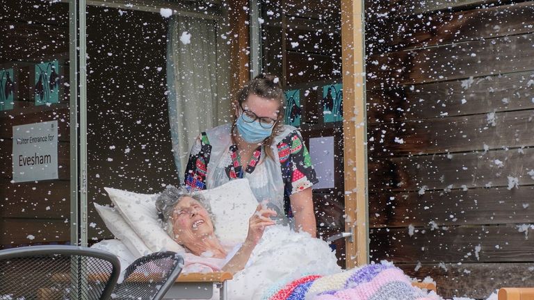 Helen, a patient at St Richard&#39;s Hospice in Worcester, was able to see snow again thanks to a little help from a snow machine