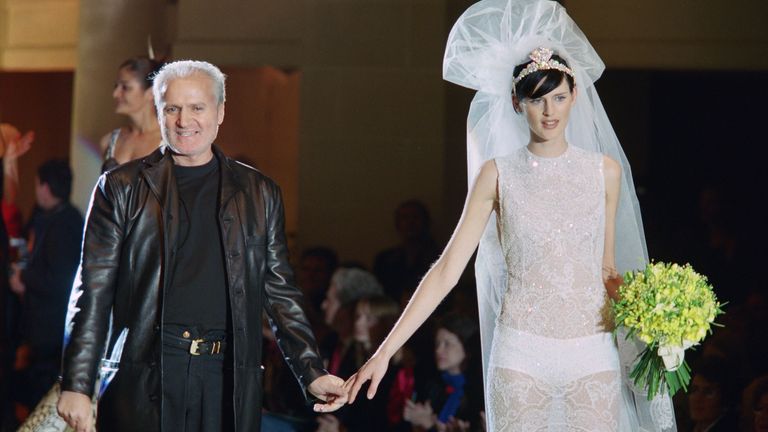 Gianni Versace with model Stella Tennant wearing a wedding dress, on January 20, 1996 in Paris