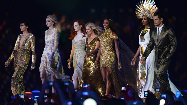 (L-R): British models Stella Tennant, Lily Cole, Karen Elson, Kate Moss, Naomi Campbell, Jourdon Dunn and David Gandy perform at the Olympic stadium during the closing ceremony of the 2012 London Olympic Games in London on August 12, 2012