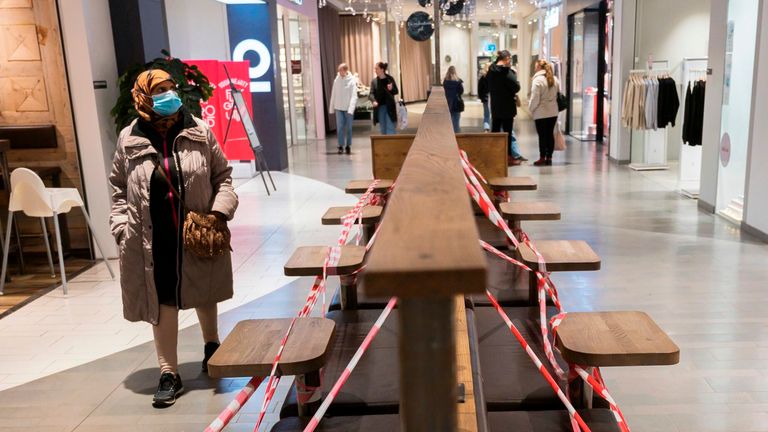 Benches are taped off at the Granbystaden shopping centre in Uppsala, Sweden