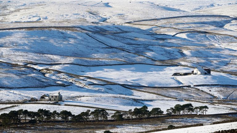 Cottages surrounded by snow in Teesdale, in the Yorkshire Dales