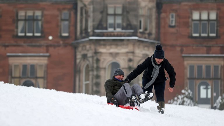 People enjoy the snow in Keele, Staffordshire, Britain, December 28, 2020. REUTERS / Carl Recine