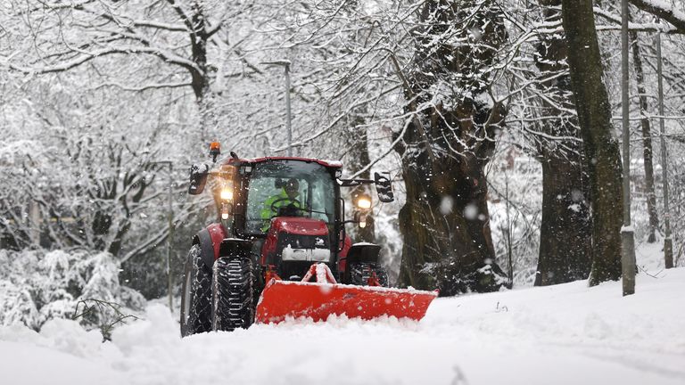 A snowplow drives down a road in Keele, Staffordshire, Britain, December 28, 2020. REUTERS / Carl Recine