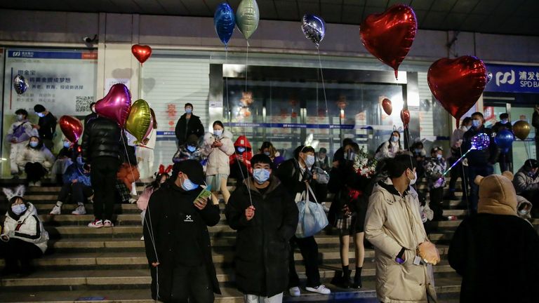 New Year&#39;s Eve celebrations in Wuhan
People hold balloons as they gather to celebrate the arrival of the new year during the coronavirus disease (COVID-19) outbreak in Wuhan, China December 31, 2020. REUTERS/Tingshu Wang