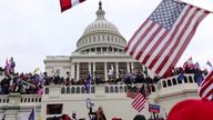 capitol with protesters in front