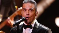 Singer Robbie Williams performs during the Bambi 2016 media awards ceremony in Berlin, Germany, November 17, 2016 REUTERS/Hannibal Hanschke
