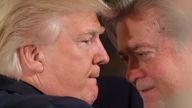 FILE PHOTO: U.S. President Donald Trump talks to chief strategist Steve Bannon during a swearing in ceremony for senior staff at the White House in Washington