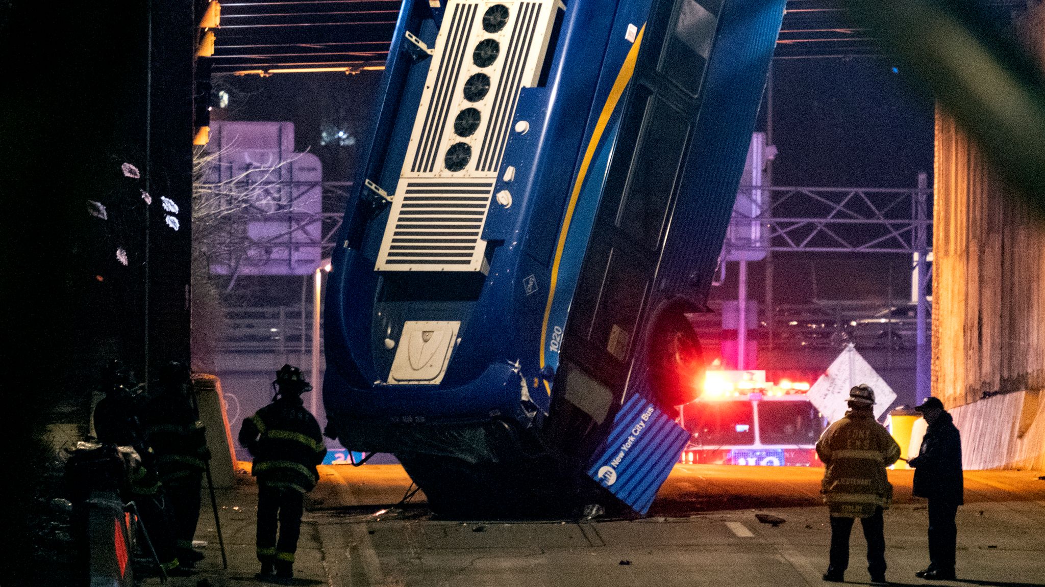 New York bus crash Nine injured after vehicle plunges 49ft off bridge