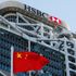 HSBC record annual profits dented by China woes